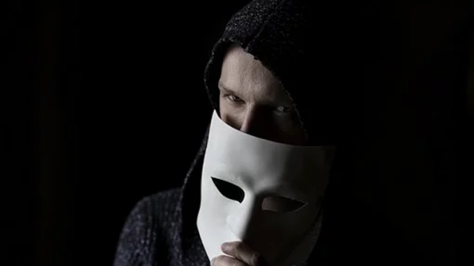 Scammer with a mask