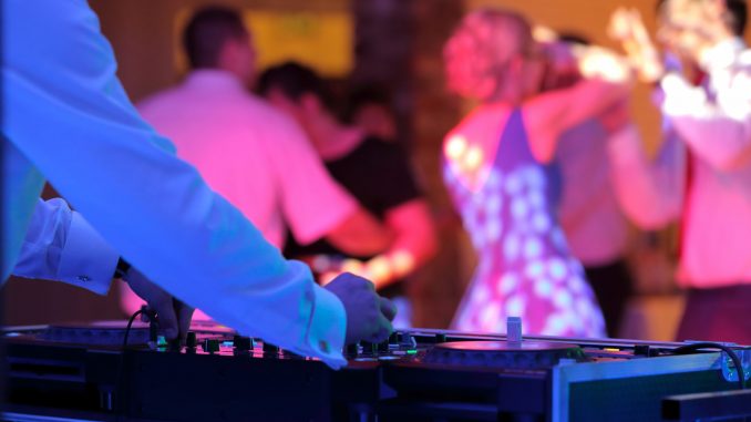 Dancing couples during party or wedding celebration